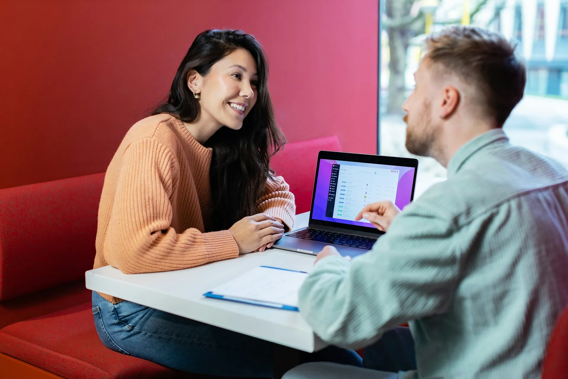 An advisor helps a student with her requests